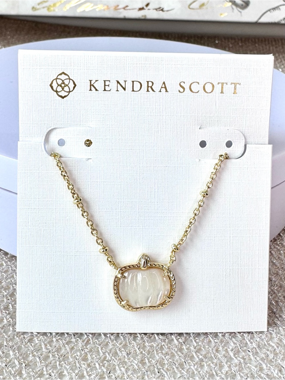Kendra Scott White Pumpkin Pendant Necklace in Goldtone